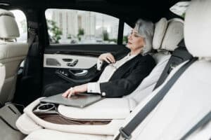 woman in backseat of car